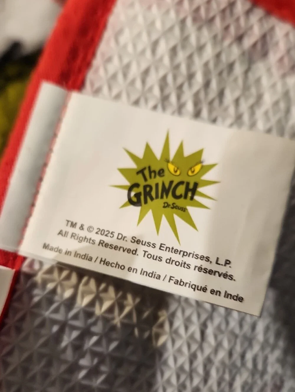 Dr. Seuss The Grinch White & Red Plush Bath Mat with Yellow Motif